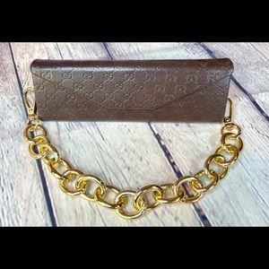 Gucci pouch that can hold lipstick, money, cards, ink pens, sunglasses etc-